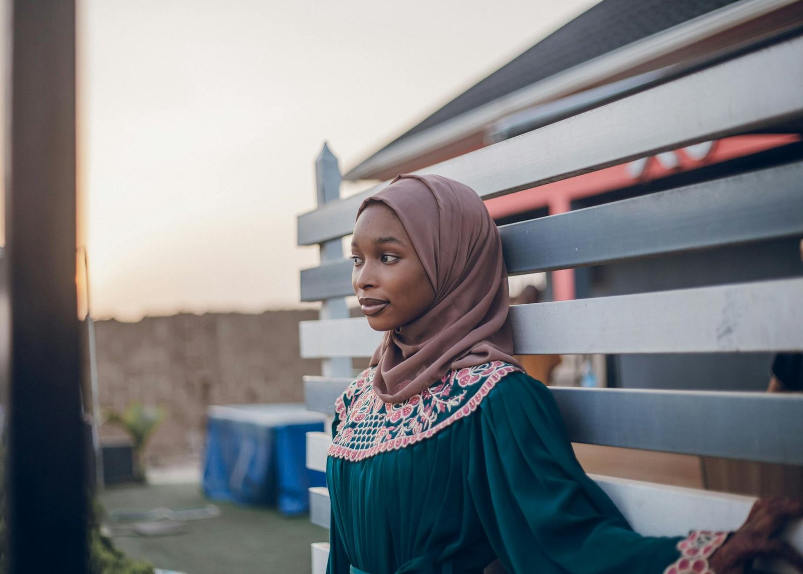 portrait of a young woman in hijab at sunset