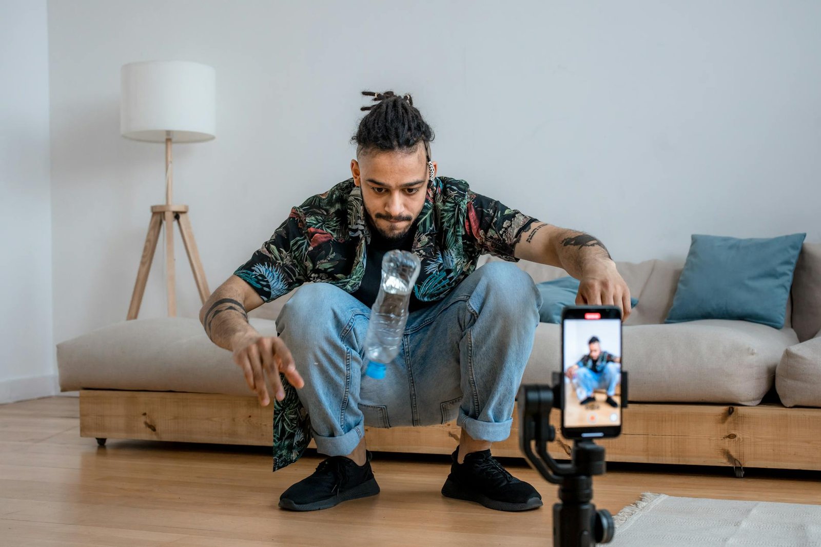 a man doing bottle flip challenge